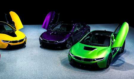 Sports cars with different colors and opened doors