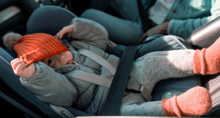 baby smiling because of Items for comfortable drive