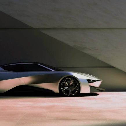 A new gray future car in front of a wall
