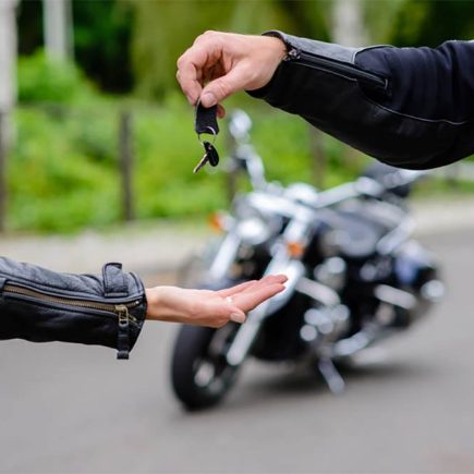 A man successfully performs the best way to sell a motorcycle